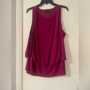 Lane Bryant pink sleeveless shirt fitted at bottom